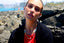 Model image of Venessa Arizaga FW26 Cosmic Roadtrip Necklace - A golden beaded necklace with classic icons - heart, smiley, alien, daisy, camera, clover, star - perfect for everyday layering,  and Venessa Arizaga FW26 Cosmic Roadtrip Bracelet - A golden beaded bracelet with classic icons - camera, smiley, butterfly, star, cactus, ladybug - perfect for everyday layering. 