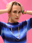 Model wearing Venessa Arizaga SS26 Color Crush Necklace layered with Love in Color adjustable Necklace worn as a choker, Peace Out Sparkle earrings, with Color Crush Bracelet and stacked Bright side Rainbow charm and cord bracelets for everyday colorful wear