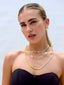 Venessa Arizaga SS26 Good Vibes Only Necklace draped at the collarbone, smiley charms dancing against bronzed skin for happy-go-lucky salt-air resort energy, with sparkling stud and charm dangling earrings - Peace Out Sparkle Earrings and Smiley Sparkle Earrings, perfect for radiating happiness and positivity.