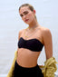 Venessa Arizaga SS26 Good Vibes Only Necklace draped at the collarbone, smiley charms dancing against bronzed skin for happy-go-lucky salt-air resort energy and SS26 whimsical layering