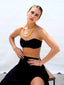 Venessa Arizaga SS26 Good Vibes Only Bracelet on wrist — adjustable black threadwork with multi-layer gold chains, glass pearls, and beaming smiley face charms; adjustable friendship bracelet design radiating handmade positivity, with rainbow and neon glass pearls Happy AF Elastic Bracelet, and Sugar Rush Necklace (Smile) made with leather cord, glass and ceramic charms with hand charm dangling earrings - Peace Out Sparkle Earrings and Smiley Sparkle Earrings, perfect for radiating happiness and positivity.