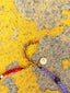 Close up image of Venessa Arizaga FW26 Rainbow Reaction Necklace - A colorful beaded necklace with rainbow jade gradient beads and glass and ceramic charms including lipstick, ladybug, smiley, daisy, mushroom, cactus, eyeball, and alien. Perfect for every day layering