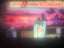 Sign for Little Havana Restaurante with a sunset and palm tree design.