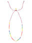 Venessa Arizaga SS26 Rainbow Heartbeat Necklace — vibrant heart focal with rainbow glass and mother-of-pearl charms on adjustable blue/coral threadwork; joyful mixed-media everyday necklace that can be worn long or as a choker.