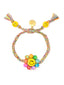 HAPPY FLOWER BRACELET (RAINBOW TIE-DYE) - Venessa Arizaga -  A colorful handmade macrame bracelet with a smiley flower focal in rainbow tie-die charms.