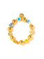 Venessa Arizaga FW26 Glitter Galaxy Bracelet - A golden beaded bracelet with classic icons - rainbow, smiley, butterfly, eyeball, mushroom, clover - perfect for everyday layering 