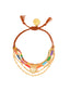 Venessa Arizaga FW26 Sweetheart Sparkle Bracelet (Rainbow) - A layered bracelet with rust threadwork, rainbow seed beads, gold plated chains, rhinestone chain, and a pave heart charm.