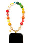 Venessa Arizaga FW26 Over The Rainbow Phone Leash - A colorful phone strap/bag charm with with rainbow gradient charms including heart, flower, smiley, clover, eyeball, star, cloud, and ladybug in ceramic, wood, and glass.