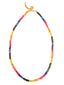 Venessa Arizaga Happy Waves Necklace -  A rainbow shell beaded necklace with golden accents and glass smiley face charm.