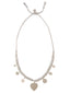 Venessa Arizaga Silver Sky Necklace - An adjustable necklace with silver threadwork, glass charms, and metal charms: heart, star, smiley
