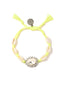 Venessa Arizaga Crystal Tide Bracelet - An adjustable friendship bracelet with neon yellow threadwork, natural shell charms, and glass rhinestone center charm.