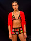 Venessa Arizaga SS26 Rainbow Aura Necklace layered at collarbone with the Rainbow Heartbeat Adjustable Necklace worn as a choker, Rainbow Aura Bracelet with multilayer chains and rainbow beads on the wrist, charms catching the light, styled with Peace Out Sparkle Earrings and Shimmer Huggie Hoops Pave earring with mushroom, and a stack of Good Energy elastic bracelets with jade and icon charms, for sun-drenched Paradisiac escape and effortless beach vibe.