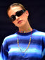Model wearing Venessa Arizaga SS26 Color Crush Necklace, adjustable beaded threadwork and chains, layered with Love in Color adjustable glass bead rainbow Necklace worn as a choker, Peace Out Sparkle stud-drop pave earrings, for everyday colorful wear
