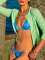 Model image of Venessa Arizaga FW26 Sweetheart Sparkle Necklace (Rainbow) - A statement adjustable  layered necklace with rust threadwork, rainbow seed beads, gold plated chains, rhinestone chain, and a pave heart charm, and Sweetheart Sparkle Bracelet (Rainbow) - A layered bracelet with rust threadwork, rainbow seed beads, gold plated chains, rhinestone chain, and a pave heart charm